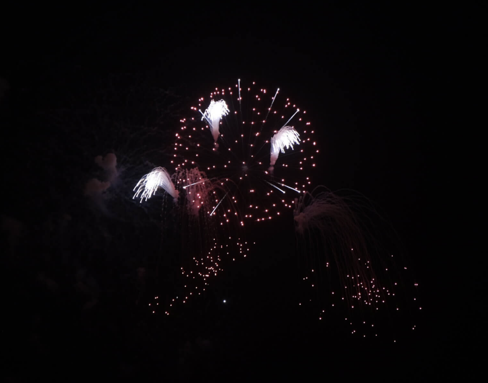 PHOTOS Orchard Beach sky lights up for early Fourth of July fireworks