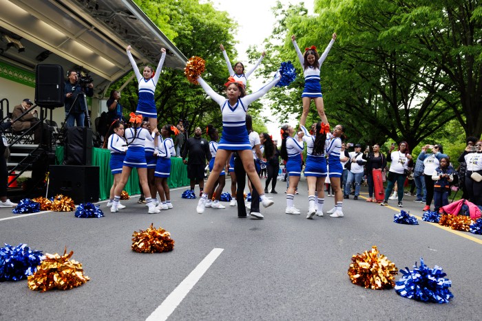 Cheerleaders on Mosholu Parkway during the annual Bronx Week parade on Sunday, May 19, 2024.