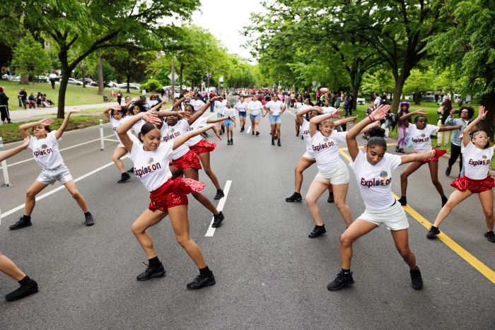 Revelers make their way up Mosholu Parkway during the annual Bronx Week parade on Sunday, May 19, 2024.