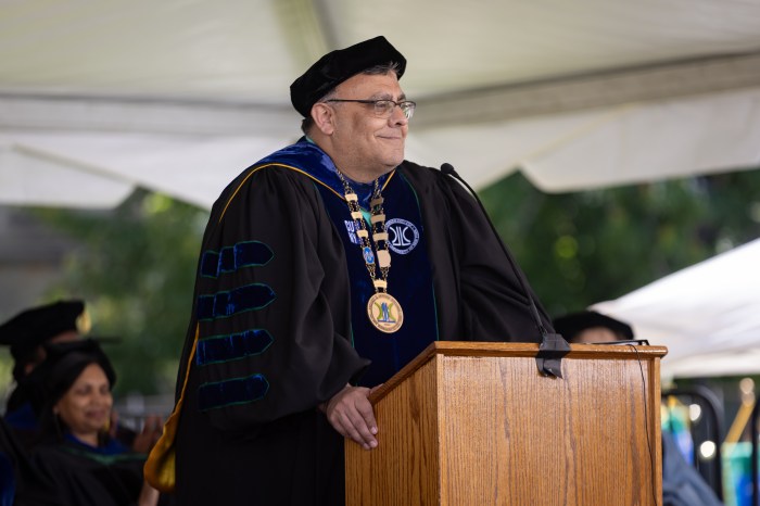 <span class="image-caption"><span class="image-credit">Dr. Fernando Delgado delivers the presidential address. Photo courtesy Lehman College Multimedia Center and BronxNet