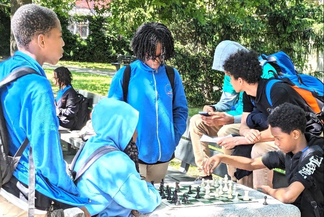 Students gather to play chess at Seton Falls Park on Friday, May 24, 2024.