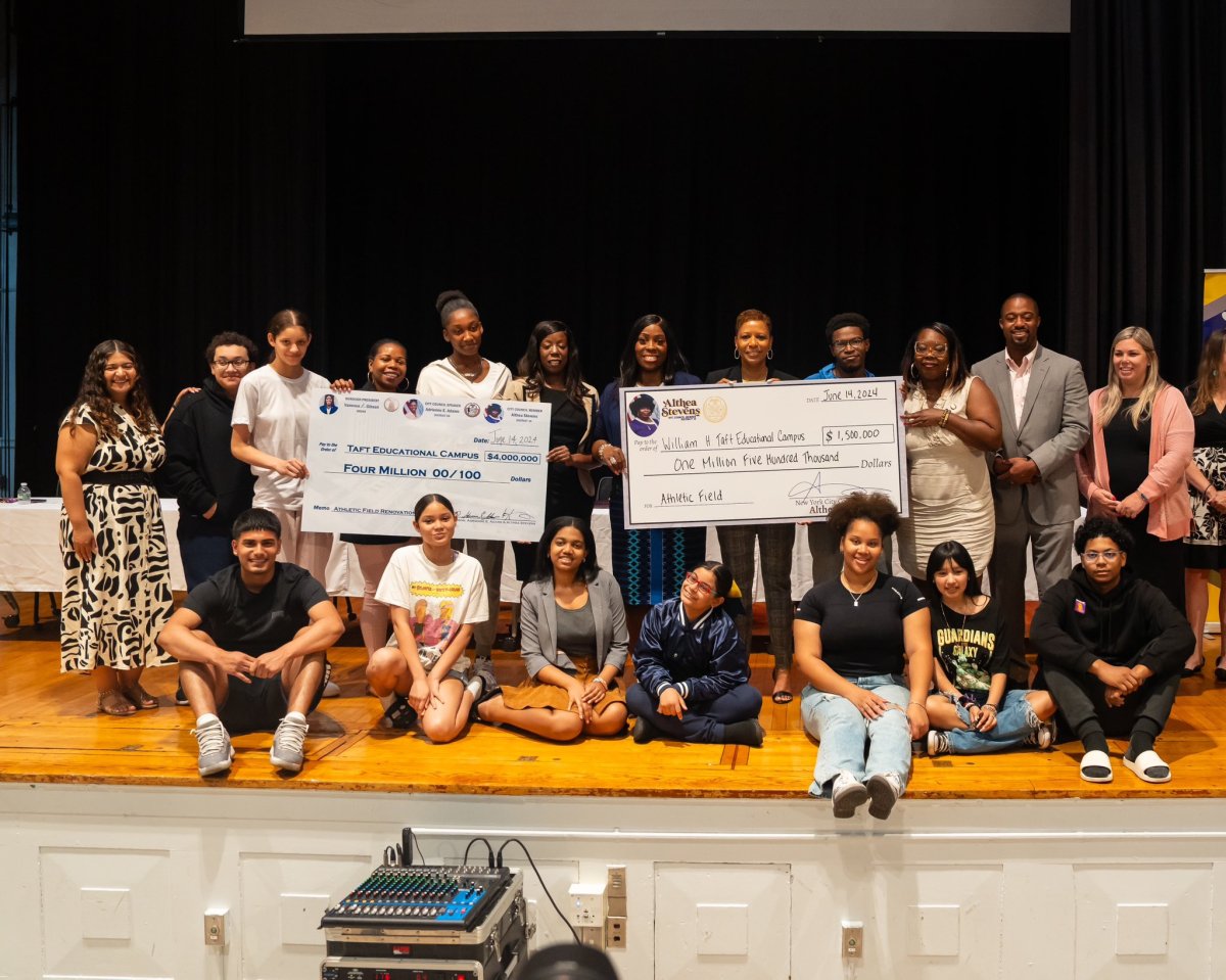 Bronx Borough President Vanessa L. Gibson, City Council Speaker Adrienne Adams, Council Member Althea Stevens and Assemblymember Landon Dais joined school officials in the auditorium of the William H. Taft Educational Campus in the Claremont section of the Bronx on June 14 to present a $5.5 million check for upgrades toward the renovation of the Jonathan Levin Field. 