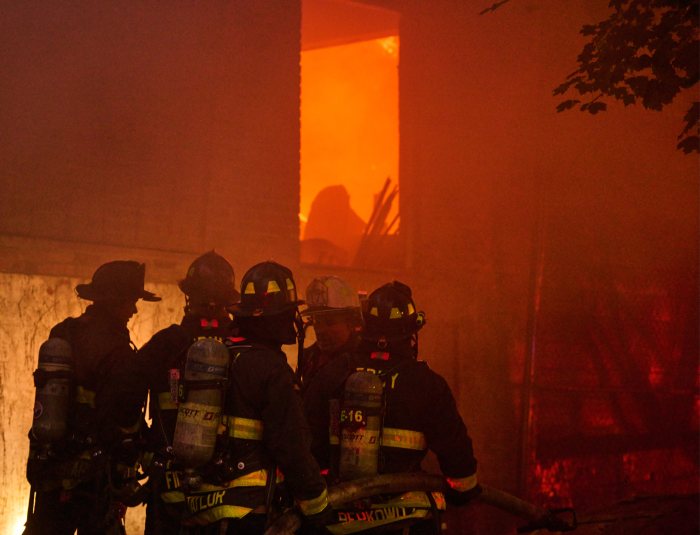 Firefighters at the scene of a three-alarm fire in Port Morris on July 1, 2024.