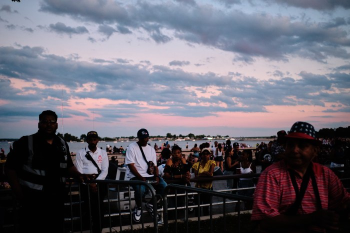 Bystanders stop to soak in the sounds of Uptown Royalty on Orchard Beach on June 27, 2024.
