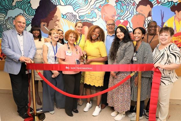 <span class="image-credit">NYC Health + Hospitals/North Central Bronx unveils a Waves of Healing, a new mural developed by artist Sophia Victor. Photo courtesy NYC Health + Hospitals.
